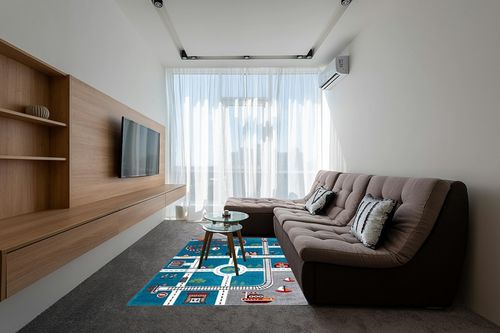 SAFAVIEH Carousel Kids Collection Area Rug - 5'3" x 7'6", Turquoise & Ivory, Non-Shedding & Easy Care, Ideal for High Traffic Areas for Boys & Girls in Playroom, Nursery, Bedroom (CRK192K) in Grey Living Room with Brown Couch