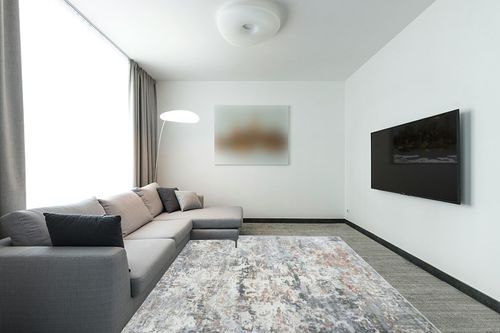 Miukiki 8x10 Area Rugs for Living Room,Anti-Slip Backing Washable Rug,Stain Resistant Modern Abstract Large Area Rug,Ultra-Thin Room Decor Rugs (Orange/Grey,8'x10') in Modern Living Room with Grey Couch