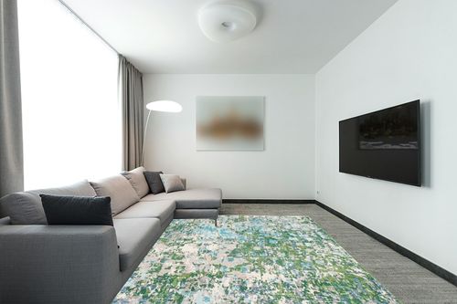 SAFAVIEH Madison Collection Area Rug - 8' x 10', Green & Turquoise, Boho Abstract Distressed Design, Non-Shedding & Easy Care, Ideal for High Traffic Areas in Living Room, Bedroom (MAD425Y) in Modern Living Room with Grey Couch