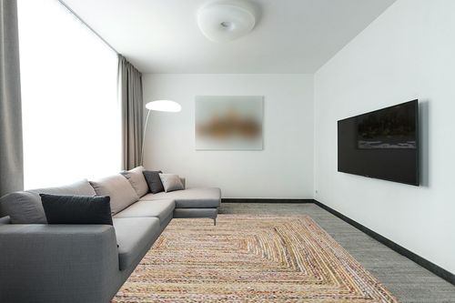 SAFAVIEH Cape Cod Collection Area Rug - 8' x 10', Beige & Multi, Handmade Boho Braided Jute & Cotton, Ideal for High Traffic Areas in Living Room, Bedroom (CAP202B) in Modern Living Room with Grey Couch