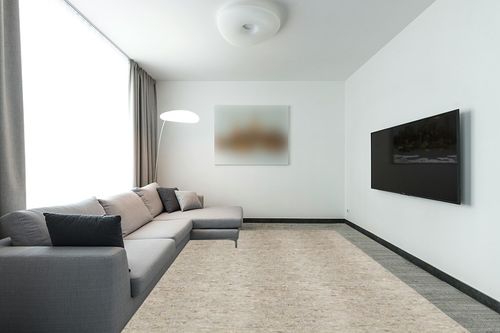 Mohawk Home 9' x 12' 3/8 Rug Pad 100% Felt Protective Cushion, Premium Comfort Underfoot – Safe for All Floors in Modern Living Room with Grey Couch