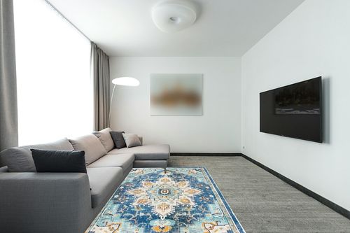 SAFAVIEH Madison Collection Area Rug - 5'3" x 7'6", Blue & Light Blue, Boho Chic Medallion Distressed Design, Non-Shedding & Easy Care, Ideal for High Traffic Areas in Living Room, Bedroom (MAD473M) in Modern Living Room with Grey Couch