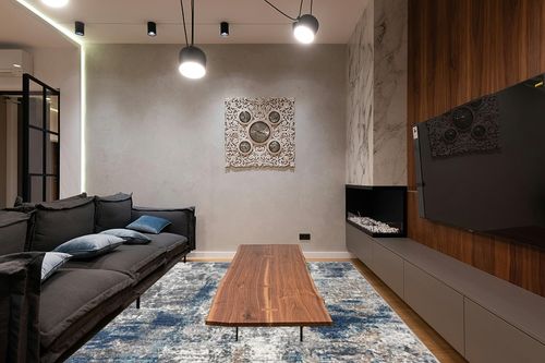 LUXE WEAVERS Euston Collection 7679 Blue 8x10 Abstract Area Rug in Dark Wood Living Room with Black Couch