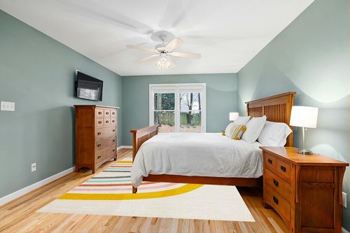 Unique Loom Whimsy Kids Collection Area Rug - Rainbow (7' 10" x 10' Rectangle, Ivory/Yellow) in Teal and Orange Wood Bedroom