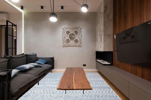 SAFAVIEH Micro-Loop Collection Area Rug - 9' x 12', Blue & Ivory, Handmade Moroccan Boho Tribal Wool, Ideal for High Traffic Areas in Living Room, Bedroom (MLP502M) in Dark Wood Living Room with Black Couch