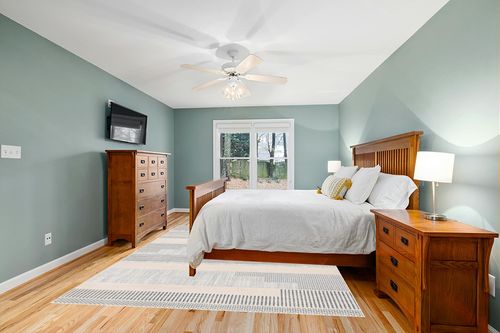 Well Woven Brer Light Blue Abstract Geometric Tribal (7'10" x 9'10") Area Rug in Teal and Orange Wood Bedroom