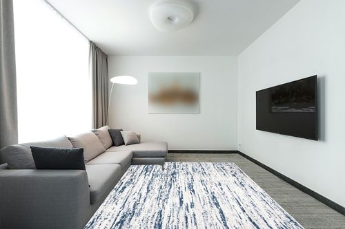 SAFAVIEH Amelia Collection Area Rug - 8' x 10', Grey & Navy, Modern Abstract Design, Non-Shedding & Easy Care, Ideal for High Traffic Areas in Living Room, Bedroom (ALA768B) in Modern Living Room with Grey Couch