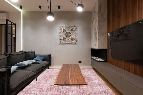 Bohemian Vintage Foldable Large Carpet in Dark Wood Living Room with Black Couch