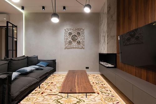 SAFAVIEH Antiquity Collection Area Rug - 8'3" x 11', Ivory, Handmade Traditional Oriental Wool, Ideal for High Traffic Areas in Living Room, Bedroom (AT14A) in Dark Wood Living Room with Black Couch