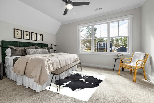 HIDES BAZAAR Dark Tricolor Cowhide Rug, Premium Quality Genuine Leather Cow Hide, Dark Brown, Black and White Area Rug (6x7 ft) in Grey Traditional Bedroom with King Bed