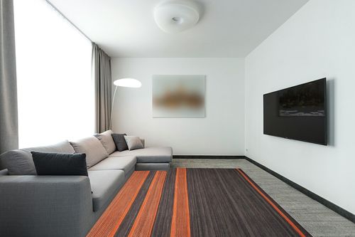SAFAVIEH Kilim Collection Area Rug - 8' x 10', Dark Grey & Orange, Handmade Flat Weave Wool, Ideal for High Traffic Areas in Living Room, Bedroom (KLM952C) in Modern Living Room with Grey Couch