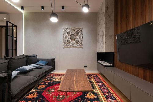 YIHOUSE Dornier Collection 9'x12' Area Rugs in Dark Wood Living Room with Black Couch