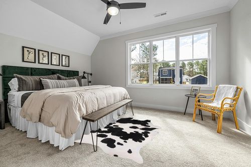 Home Must Haves Cowhide Rug, 6' x 7', Black and White in Grey Traditional Bedroom with King Bed