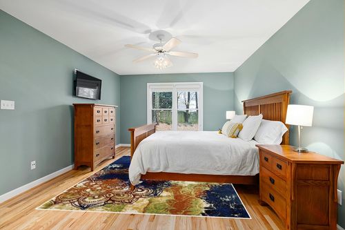 LUXE WEAVERS Modern Multicolor 1636 Mandala 8x10 Area Rug, Contemporary Bohemian Bedroom Carpet in Teal and Orange Wood Bedroom