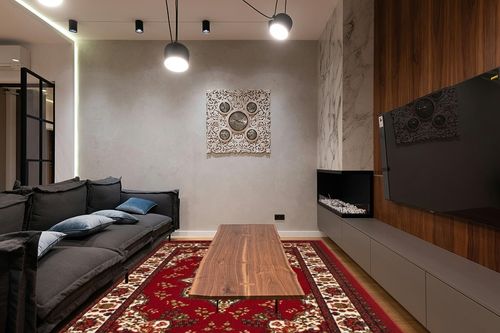 Antep Rugs Alfombras Oriental Traditional 8x10 Non-Skid (Non-Slip) Low Profile Pile Rubber Backing Indoor Area Rugs (Maroon, 7'10" x 10') in Dark Wood Living Room with Black Couch
