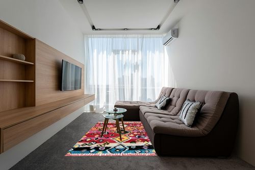 nuLOOM Alane Moroccan Tassel Shaggy Area Rug, 5x8, Multi in Grey Living Room with Brown Couch