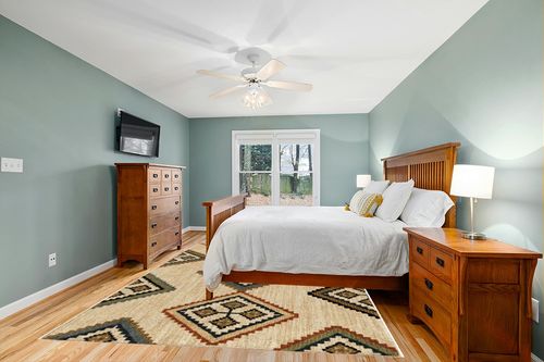 Orian Rugs Next Generation Carsitas Area Rug, 7'10" x 10'10", Off-White in Teal and Orange Wood Bedroom
