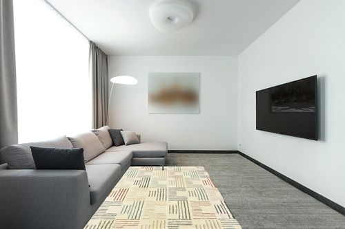 Hodgin Ivory/Multi Area Rug Zipcode Design Rug Size: Rectangle 5'3" x 7'3" in Modern Living Room with Grey Couch