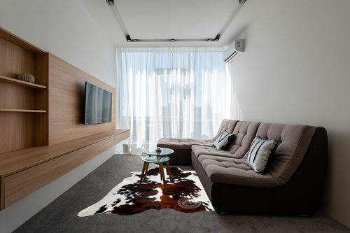 Sunshine Cowhides Genuine Tricolor Cowhide Rug - Luxurious Cow Rug for Bedroom, Living Room, and Home Decor Enthusiasts - Masterpiece of Style and Functionality - XL 6x7-8ft (180x220cm) in Grey Living Room with Brown Couch