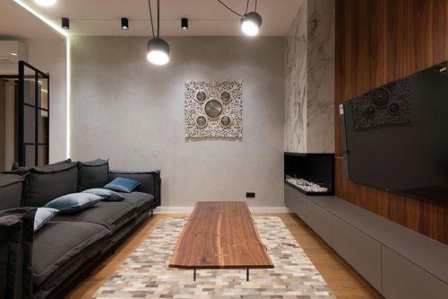 eCarpet Gallery Hand-Knotted | Area Rug for Living Room, Bedroom | Cowhide Patchwork Accent Grey Rug 6'0" x 9'0" | 331697 in Dark Wood Living Room with Black Couch