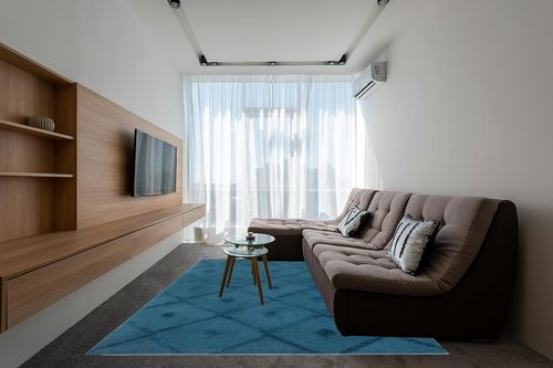 Antep Rugs Palafito 8x10 Geometric Shag Diamond High-Low Pile Textured Indoor Area Rug (Teal Blue, 7'10" x 10') in Grey Living Room with Brown Couch