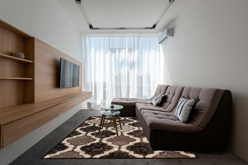 Superior Indoor Large Area Rug, Jute Backed, Perfect for Living/Dining Room, Bedroom, Office, Kitchen, Entryway, Modern Geometric Trellis Floor Decor, Viking Collection, 8' x 10', Chocolate in Grey Living Room with Brown Couch