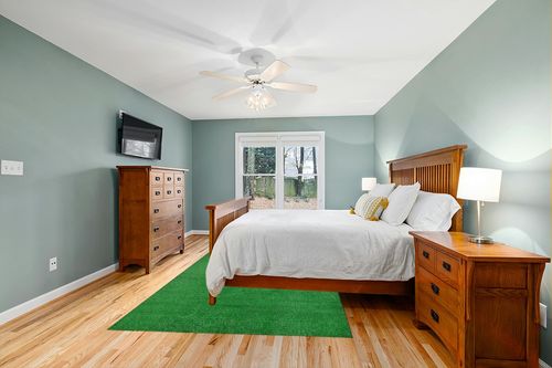 Garland Rug Artificial Grass 6 ft. x 9 ft. Large Indoor/Outdoor Area Rug Green in Teal and Orange Wood Bedroom