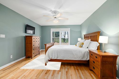 Markus Geometric Gray and Ivory Area Rug Foundstone Rug Size: Rectangle 5'3" x 8' in Teal and Orange Wood Bedroom
