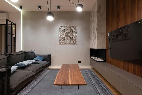 Antep Rugs Alfombras Bordered Modern 8x10 Non-Slip (Non-Skid) Low Pile Rubber Backing Indoor Area Rug (Gray, 7'10" x 10') in Dark Wood Living Room with Black Couch