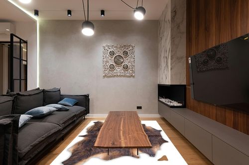 rodeo Cowhide Rug, Dark Brindle: XXL 6x8ft (180cmx240cm) in Dark Wood Living Room with Black Couch