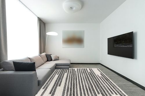 JONATHAN Y MOH207A-8 Khalil Modern Berber Stripe Indoor Farmhouse Area-Rug Bohemian Minimalistic Striped Easy-Cleaning Bedroom Kitchen Living Room Non Shedding, 8 X 10, Cream,Black in Modern Living Room with Grey Couch
