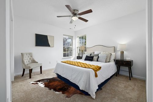 Sunshine Cowhides Genuine Dark Brindle Tricolor Cowhide Rug - Luxurious Cow Rug for Bedroom, Living Room, and Home Decor Enthusiasts - Masterpiece of Style and Functionality - 6x6-7ft (180x210cm) in White and Yellow Modern Bedroom