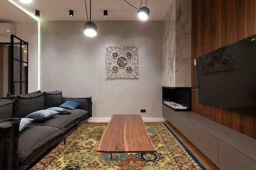 SAFAVIEH Heritage Collection Area Rug - 8' x 10', Multi & Burgundy, Handmade Traditional Oriental Wool, Ideal for High Traffic Areas in Living Room, Bedroom (HG911A) in Dark Wood Living Room with Black Couch