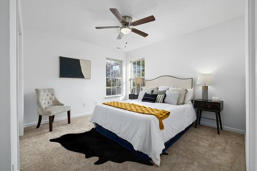 Faux Fur Cowhide Rugs (5 * 7 ft), Machine Washable Cow Print Area Carpet Black Color with Non-Slip Suede Backing, Durable & No Shedding in White and Yellow Modern Bedroom