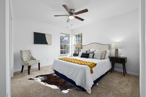 Sunshine Cowhides Genuine Brindle Dark Tricolor Cowhide Rug - Luxurious Cow Rug for Bedroom, Living Room, and Home Decor Enthusiasts - Masterpiece of Style and Functionality - 6x6-7ft (180x210cm) in White and Yellow Modern Bedroom