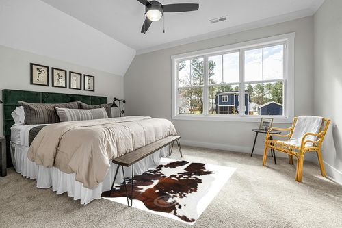 Sunshine Cowhides Genuine Tricolor Cowhide Rug - Luxurious Cow Rug for Bedroom, Living Room, and Home Decor Enthusiasts - Masterpiece of Style and Functionality - 6x6-7ft (180x210cm) in Grey Traditional Bedroom with King Bed
