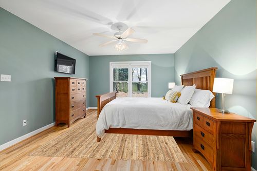 nuLOOM Rigo Hand Woven Farmhouse Jute Area Rug, 8' x 10', Natural in Teal and Orange Wood Bedroom