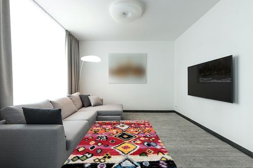 nuLOOM Alane Moroccan Tassel Shaggy Area Rug, 5x8, Multi in Modern Living Room with Grey Couch