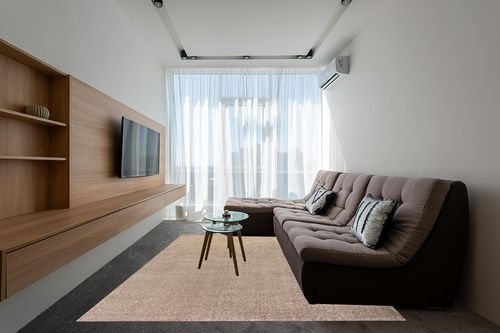 JONATHAN Y SEU100G-8 Haze Solid Low-Pile Indoor Area-Rug Casual Contemporary Solid Traditional Easy-Cleaning Bedroom Kitchen Living Room Non Shedding, 8 ft x 10 ft, Beige in Grey Living Room with Brown Couch