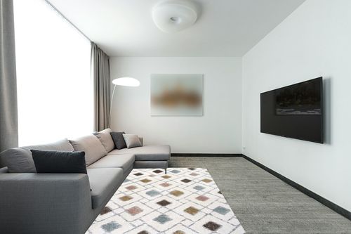Elle Geometric Machine Made Power Loom Polypropylene Area Rug in Cream/Gold/Brown ... in Modern Living Room with Grey Couch