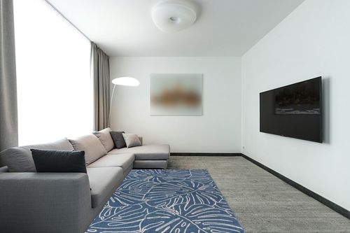 Rugshop Contemporary Tropical Leaves Weather Resistant Indoor/Outdoor Area Rug 5' x 7' Blue in Modern Living Room with Grey Couch