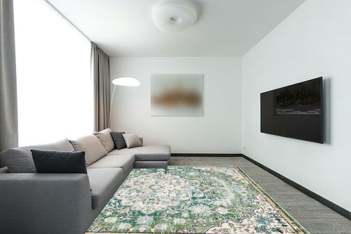 SAFAVIEH Madison Collection Area Rug - 8' x 10', Green & Turquoise, Boho Chic Medallion Distressed Design, Non-Shedding & Easy Care, Ideal for High Traffic Areas in Living Room, Bedroom (MAD447Y) in Modern Living Room with Grey Couch