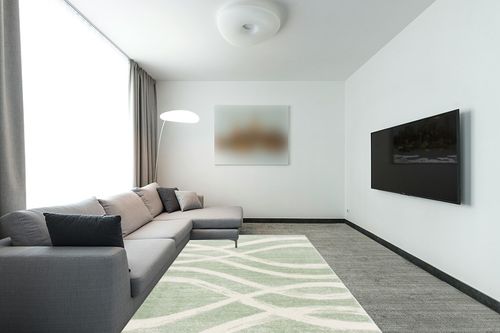 SAFAVIEH Adirondack Collection Area Rug - 6' x 9', Sage & Cream, Modern Wave Distressed Design, Non-Shedding & Easy Care, Ideal for High Traffic Areas in Living Room, Bedroom (ADR125X) in Modern Living Room with Grey Couch