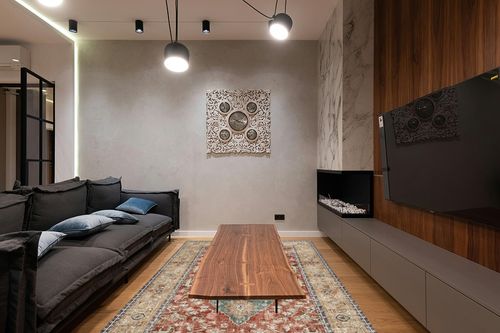 Valenrug 6x9 Area Rugs - Stain Resistant Lightweight Washable Rug, Anti-Skid Rugs for Living Room, Vintage Tribal Area Rug(Orange/Red, 6'x9') in Dark Wood Living Room with Black Couch