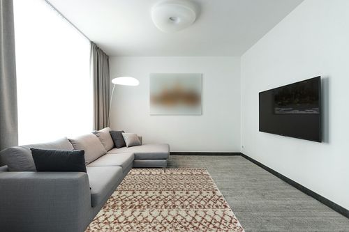 Geometric Cream/Orange Area Rug Dakota Fields Rug Size: Rectangle 5'3" x 7' in Modern Living Room with Grey Couch