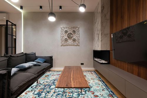 SAFAVIEH Madison Collection Area Rug - 9' x 12', Navy & Light Blue, Boho Chic Medallion Distressed Design, Non-Shedding & Easy Care, Ideal for High Traffic Areas in Living Room, Bedroom (MAD447K) in Dark Wood Living Room with Black Couch