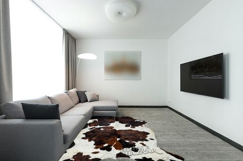 Tricolor Cowhide Rug Classic Brown, Black and White Color Mix, Natural Leather Hide, Area Rug (6x7ft) in Modern Living Room with Grey Couch