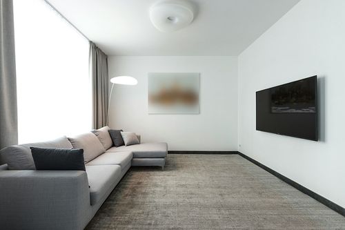 Unique Loom Solid Shag Collection Area Rug (9' x 12' Rectangle, Snow White) in Modern Living Room with Grey Couch