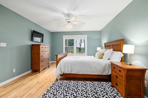 Fluffy Leopard Print Rug 4x6 Feet in Teal and Orange Wood Bedroom