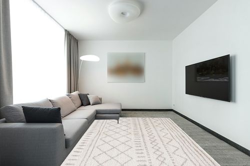SAFAVIEH Arizona Shag Collection Area Rug - 8' x 10', Ivory & Beige, Moroccan Design, Non-Shedding & Easy Care, 1.6-inch Thick Ideal for High Traffic Areas in Living Room, Bedroom (ASG741A) in Modern Living Room with Grey Couch